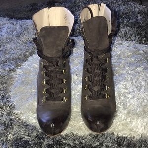 Dark brown heeled booties.